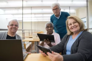 elderly people holding gadgets